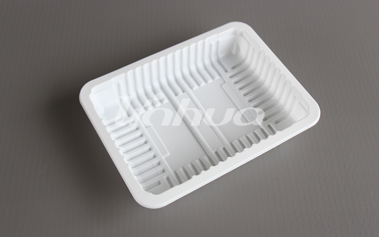 How does the design of Turned Edge Trays affect their functionality, particularly in terms of stacking, stability, and ease of handling?